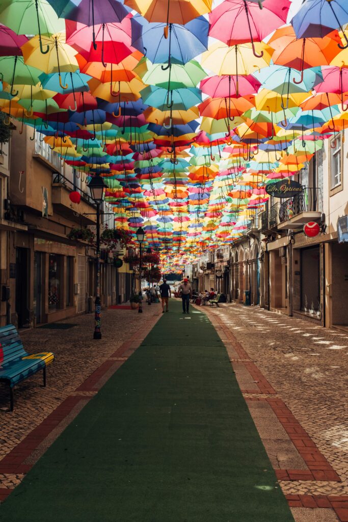 Portuguese street market with a colourful umbrella canopy