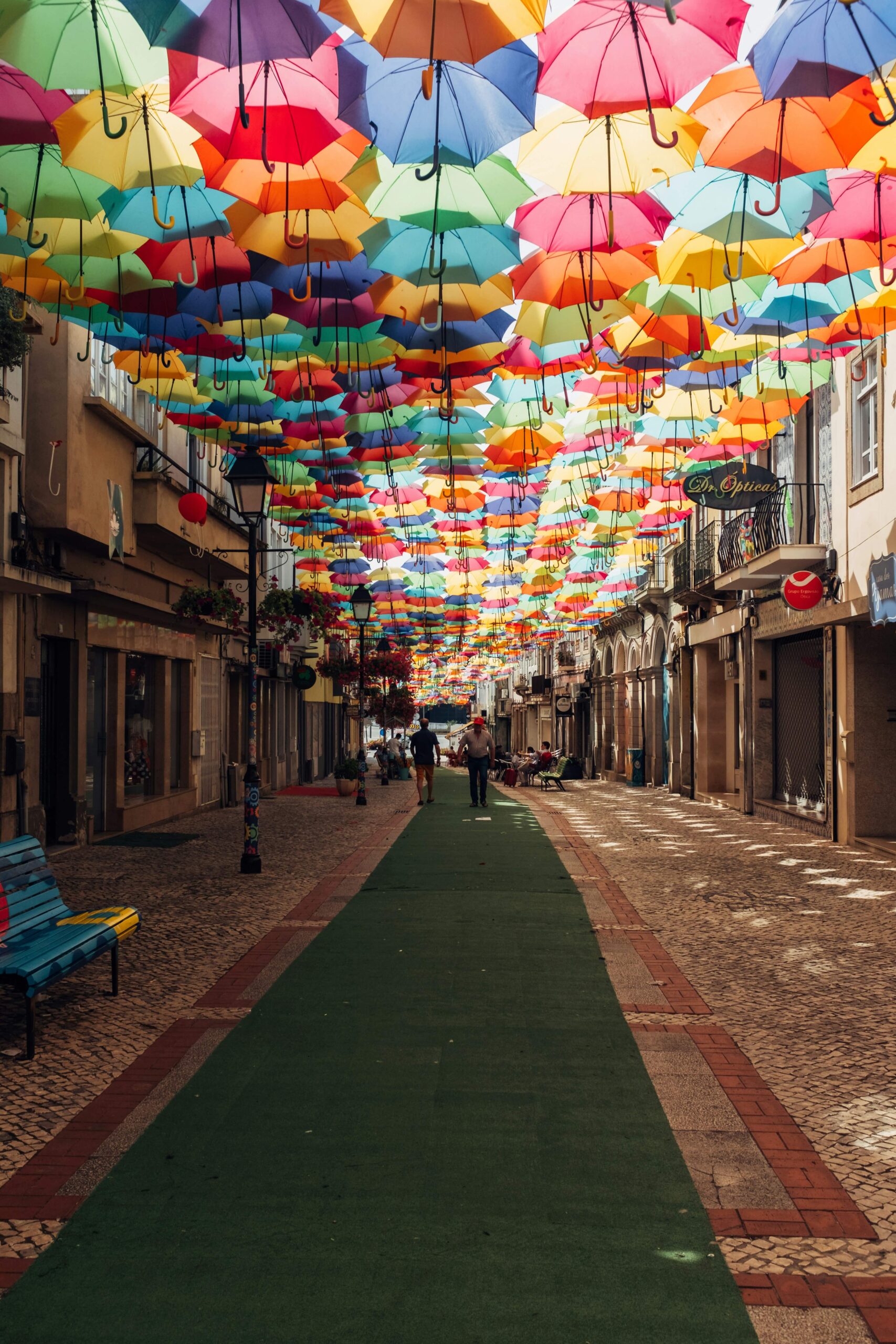 Portuguese street market with a colourful umbrella canopy